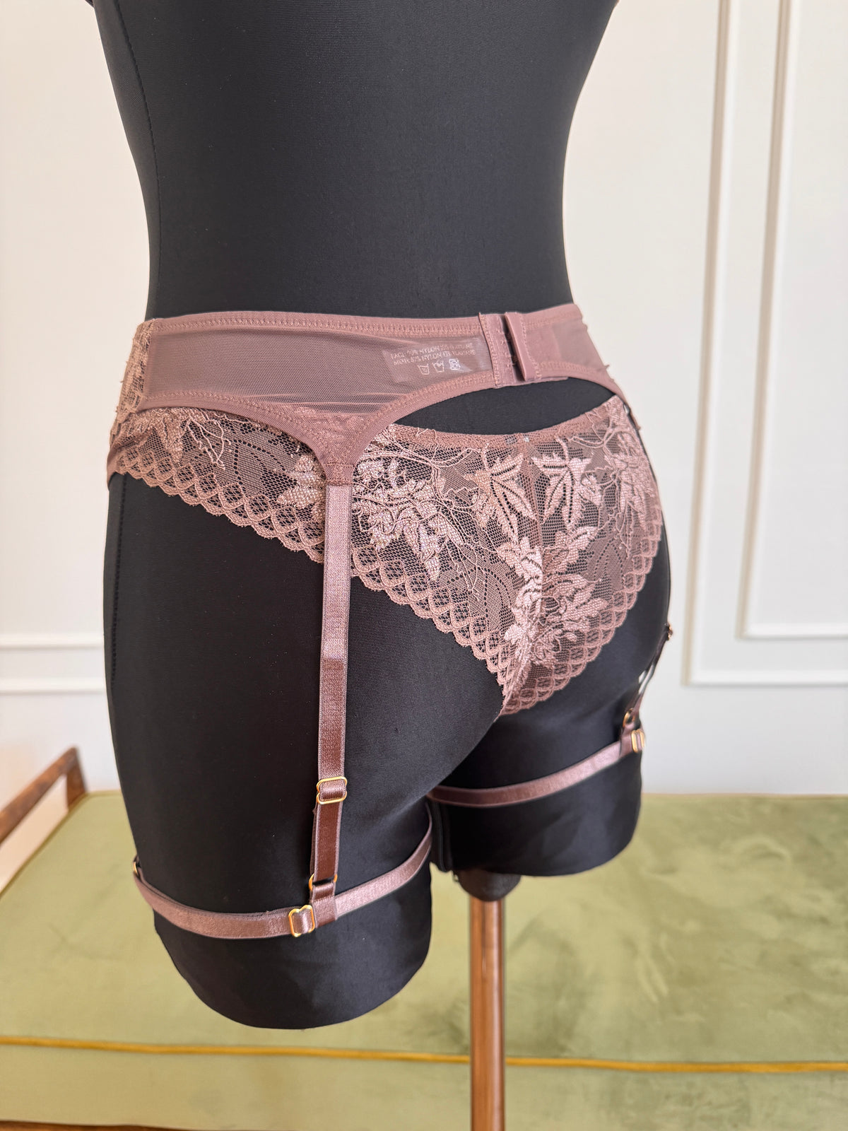 Juliette Suspender Belt in Mocha on a dress form, side view